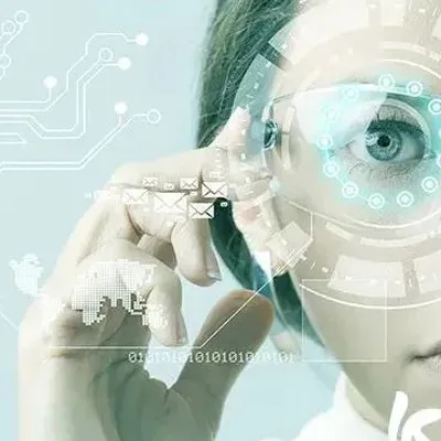 a woman holding a magnifying glass over her eye