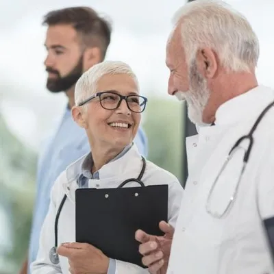 A group of doctors engaged in a discussion, sharing their expertise and collaborating on medical matters