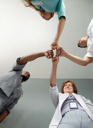 Business team collaborating on health equity innovation