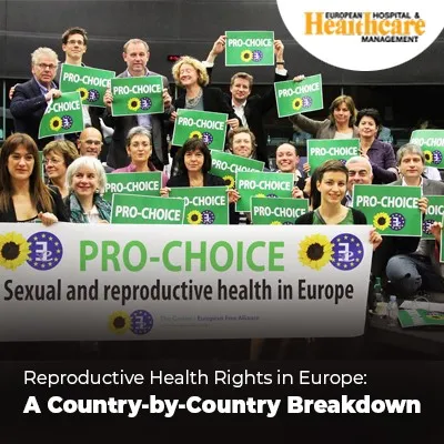 Group of people holding "PRO-CHOICE" signs at a reproductive rights event in Europe.