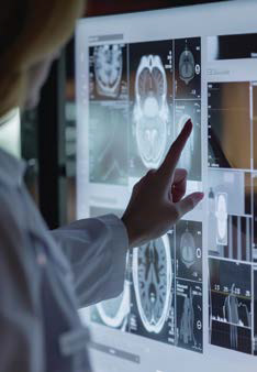 Radiology team using AI technology for sustainable diagnostic reports