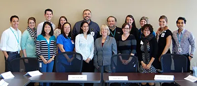 Healthcare team collaborating on patient management system